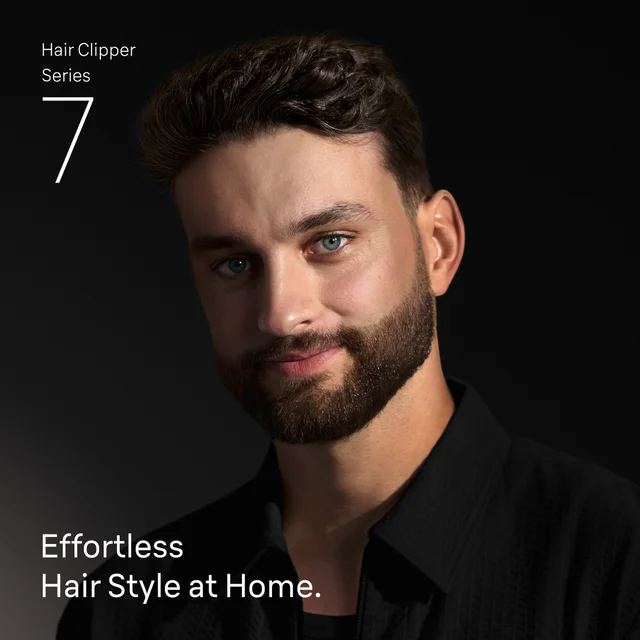 Braun Series 7 hair clipper benefit: man with neat hairstyle & beard, effortless styling at home.