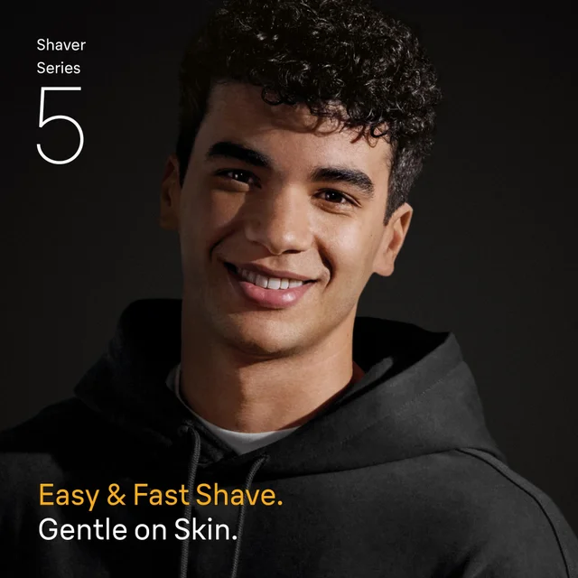 Smiling man illustrating Braun Shaver Series 5 for easy, fast, gentle shave.