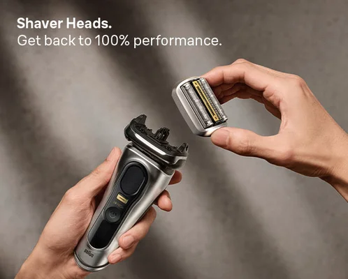 Man's hands holding Braun Shaver and Braun replacement shaver head ready to click in place. For a shaver like new every day