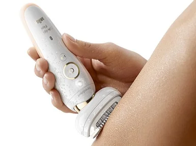 Braun Epilators - close up of woman using silk-epil 9 flex on leg
