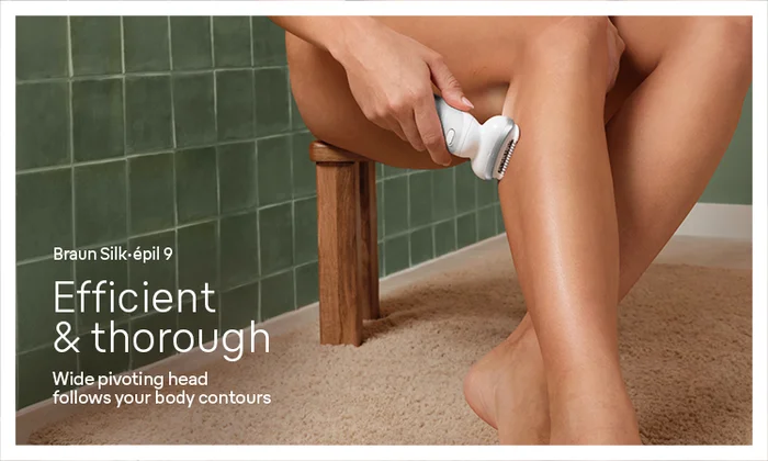 Braun Silk epil 9 being used in a bathroom to epilate a lady's legs. Comfortable and efficient.